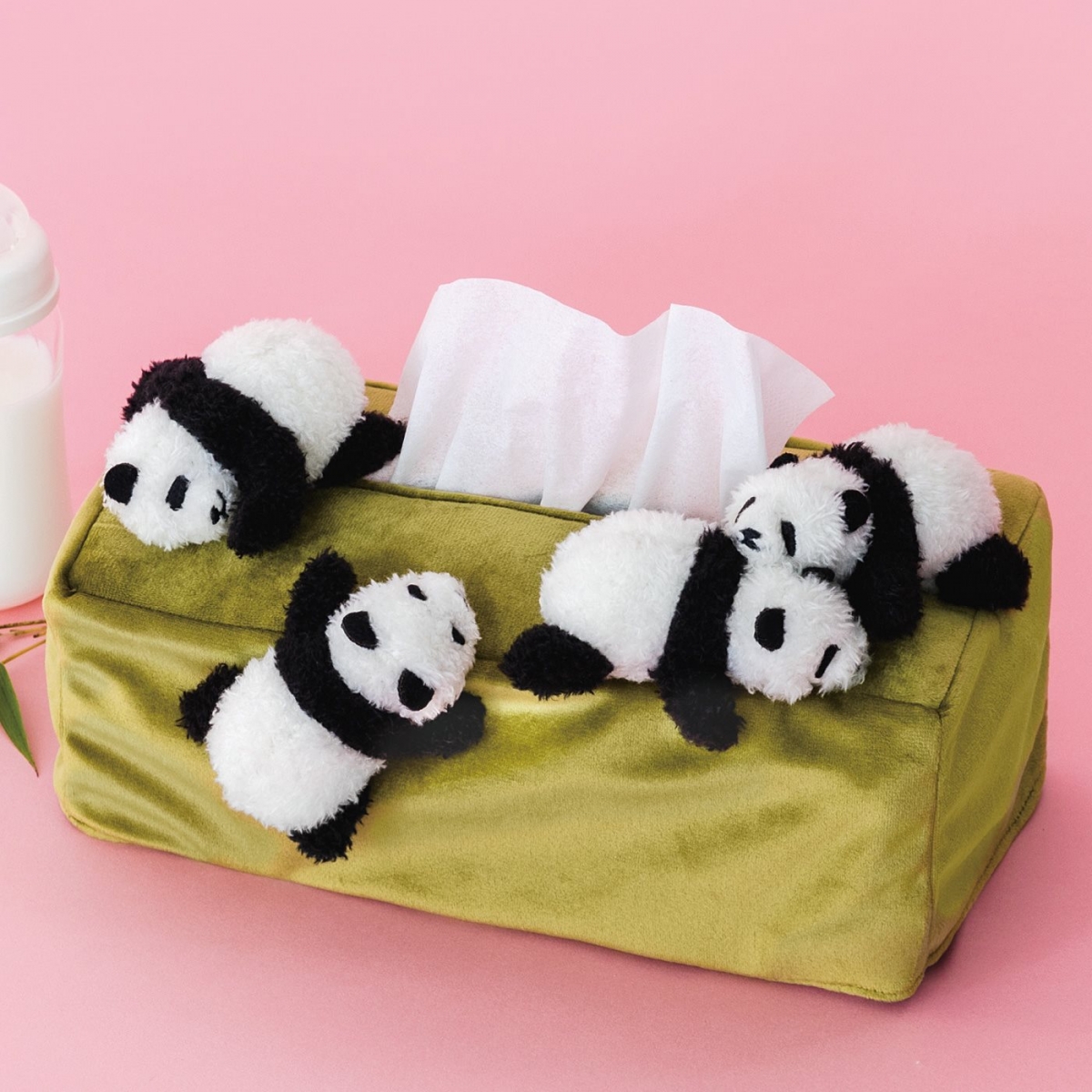 green tissue box with baby pandas