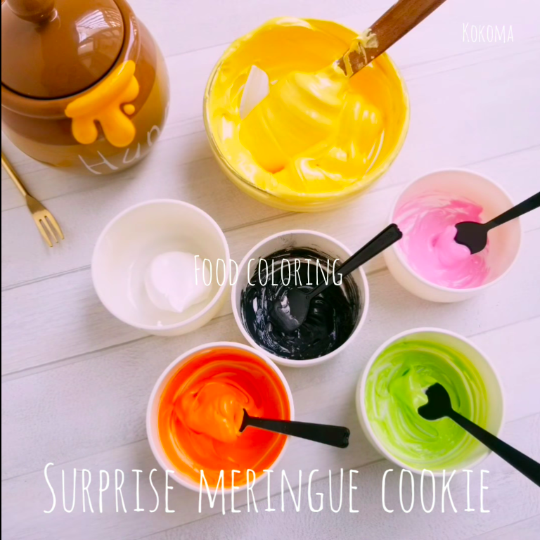 Orange, green, pink, yellow and black food colouring