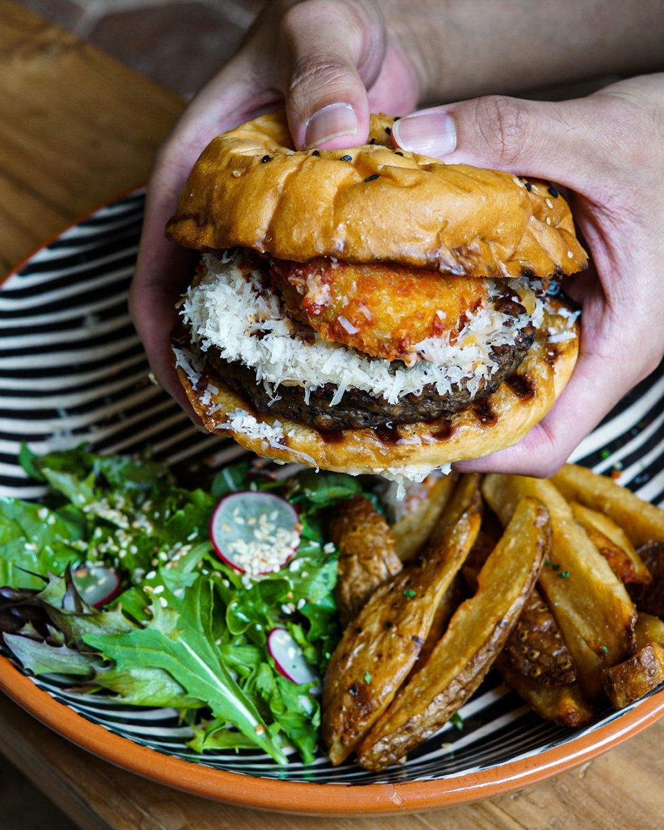 Burger served at Merci Marcel