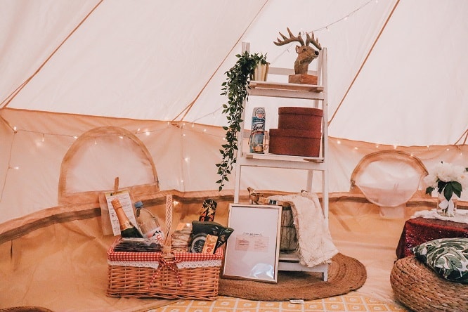 decor and basket inside glamping tent