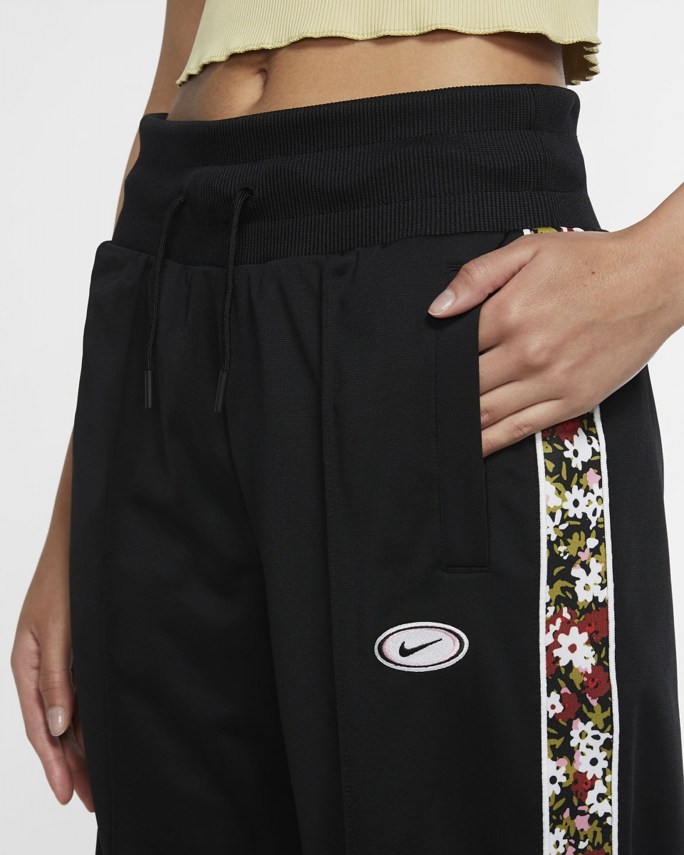 Nike floral trousers close up