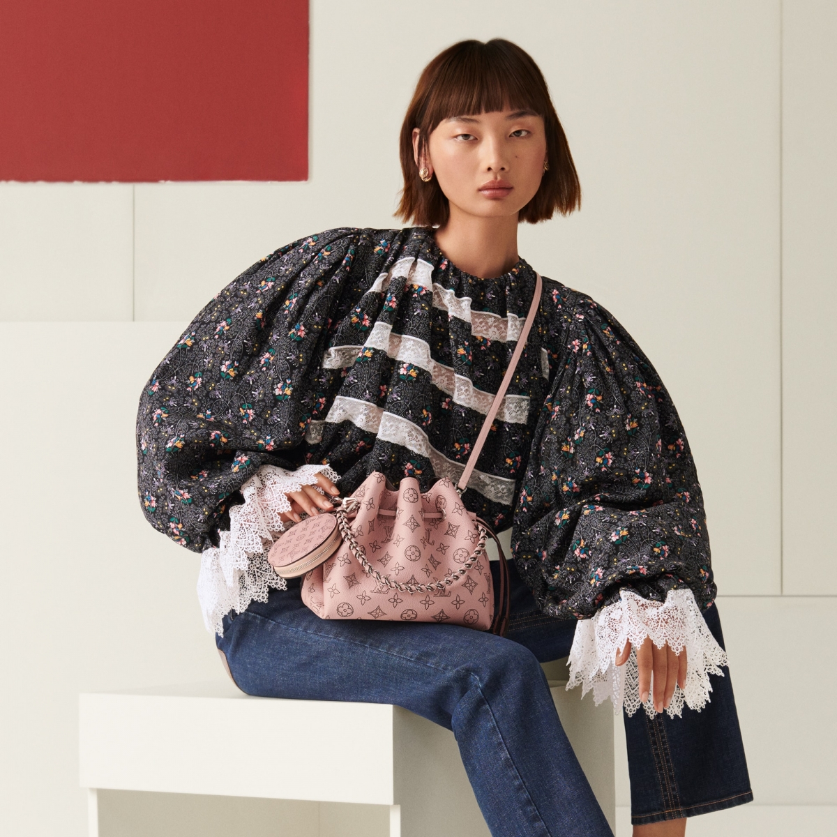 Louis Vuitton Bella bucket bag carried by model