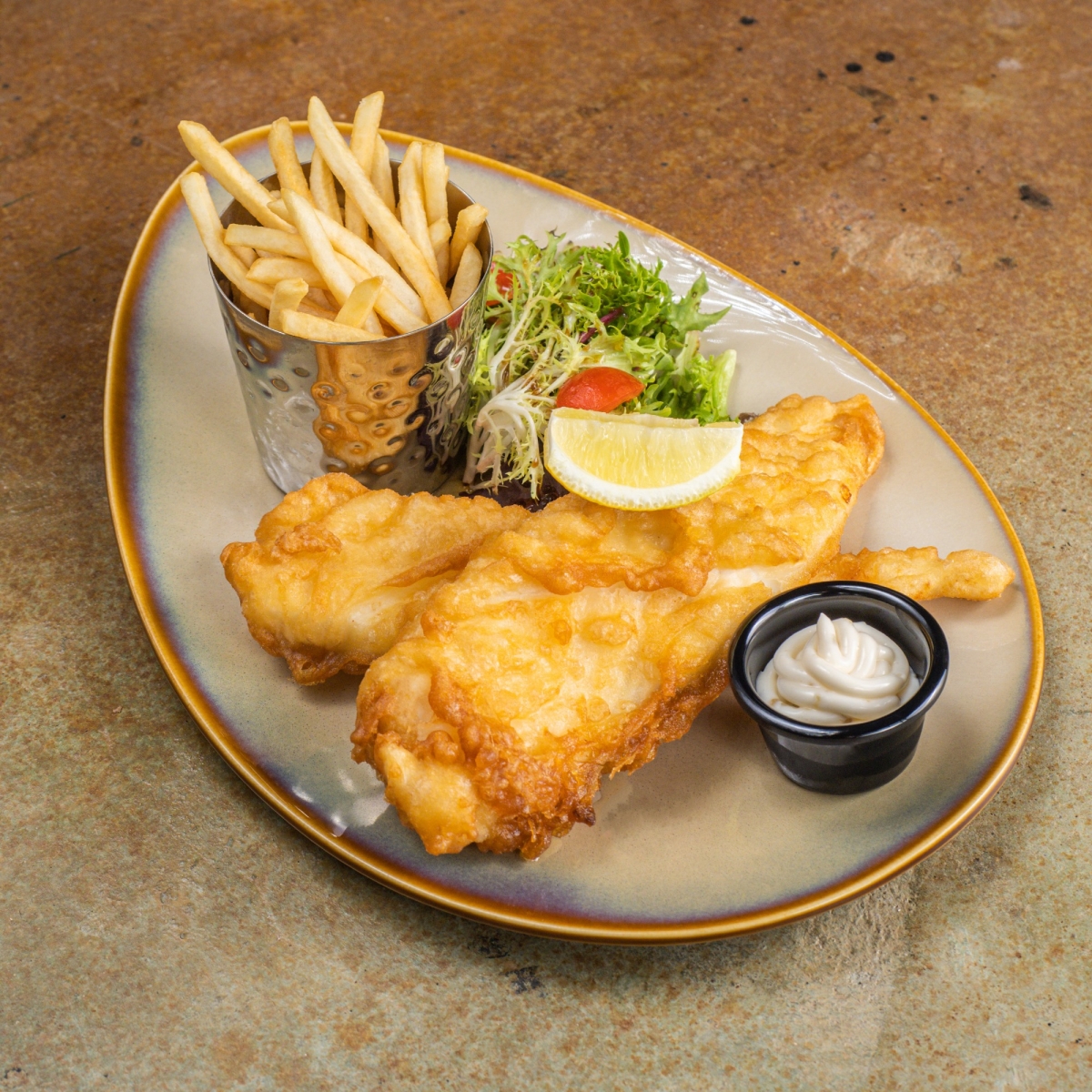 Beer Battered Fish & Chips with fries and salad