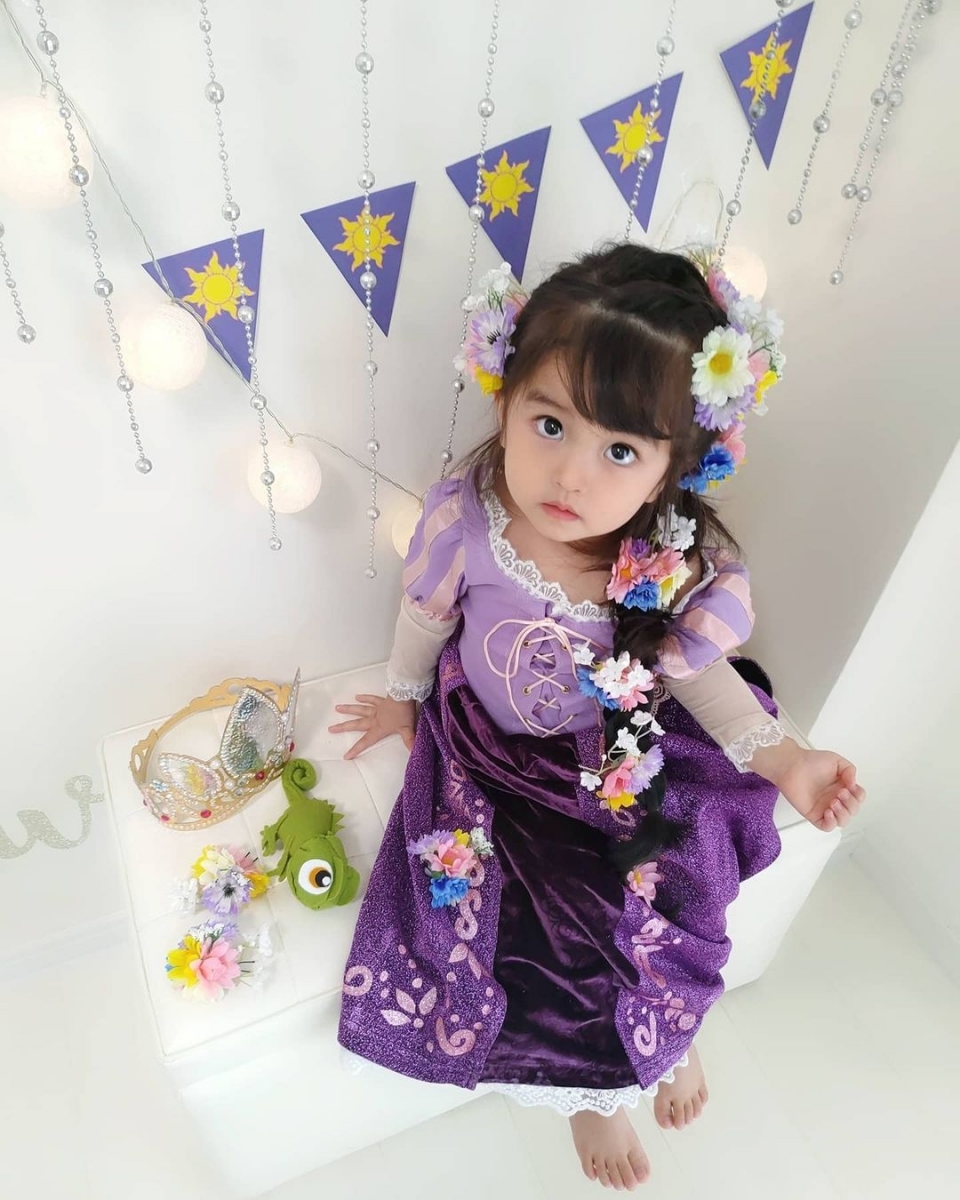 asian baby dressed as rapunzel from tangled