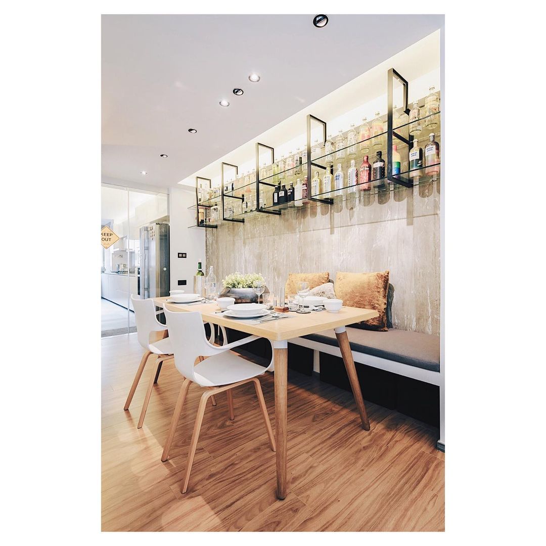 long breakfast dining nook in singapore with wall storage