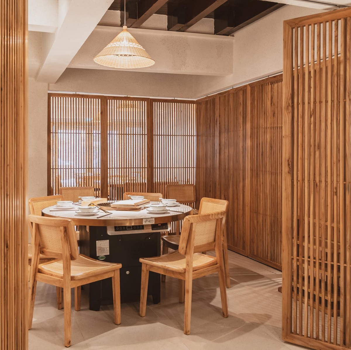 Tong Xin Ru Yi Traditional Hotpot private seating area with bamboo dividers