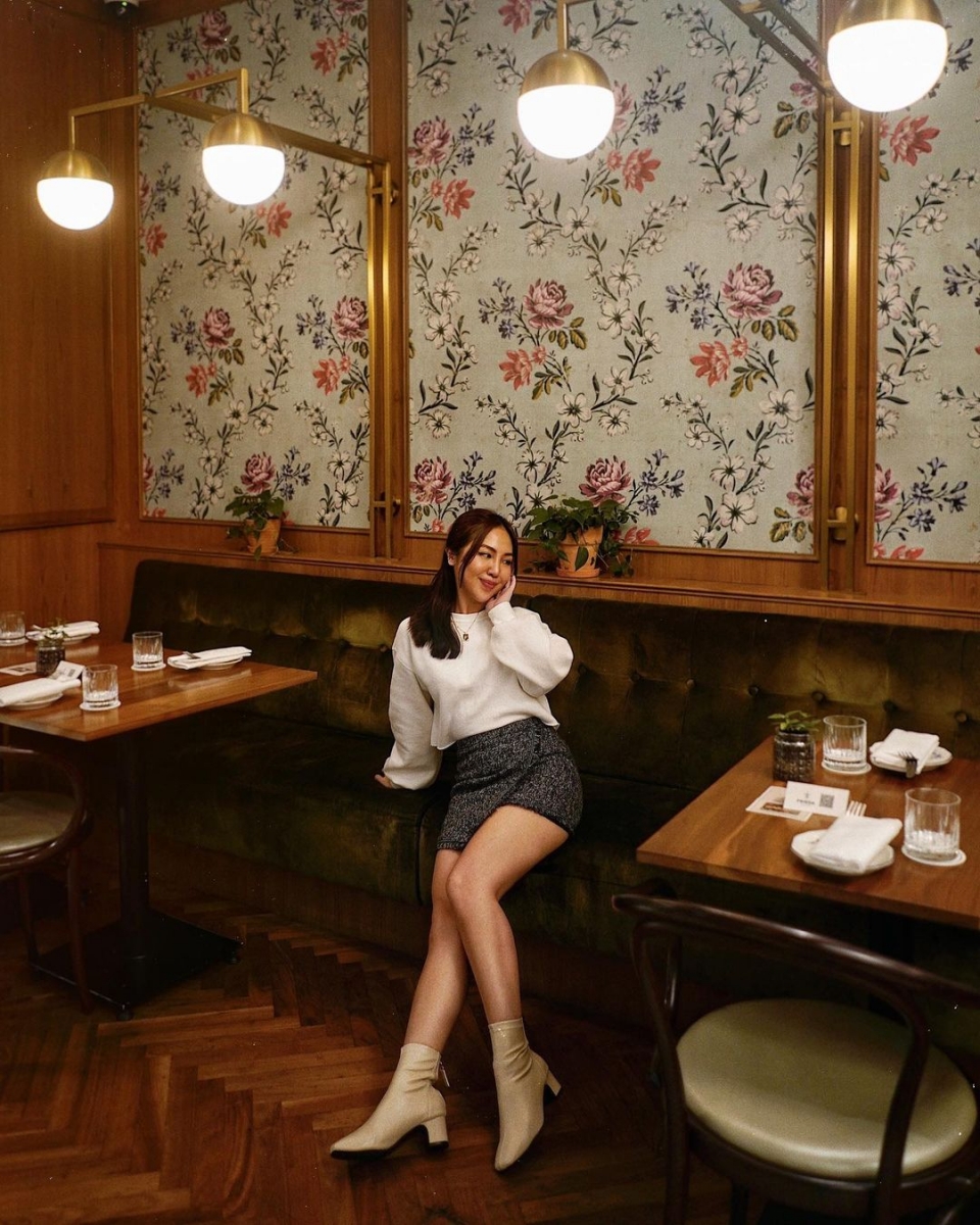vintage style freida restaurant with floral wallpaper