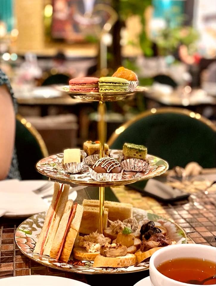three tier stand high tea at wonderland savour Alice In Wonderland-Themed Restaurant In Singapore