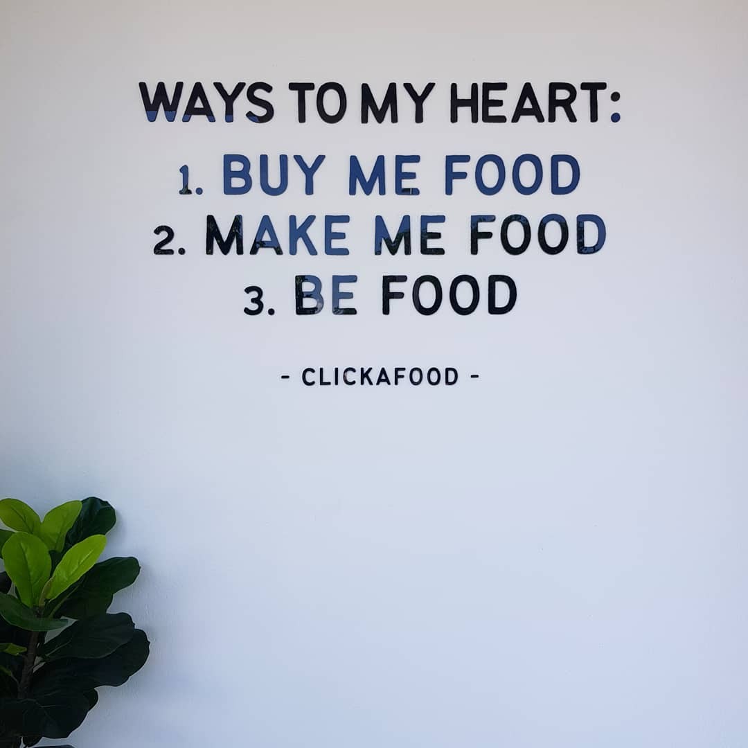 photo wall with food quotes