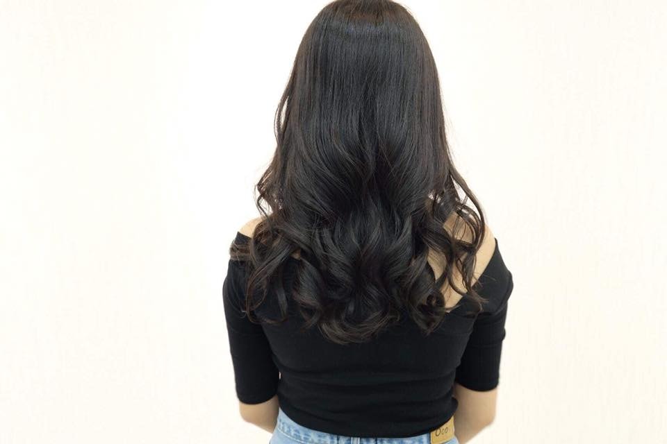 black permed curly hair at NAOKI Hair Dressing
