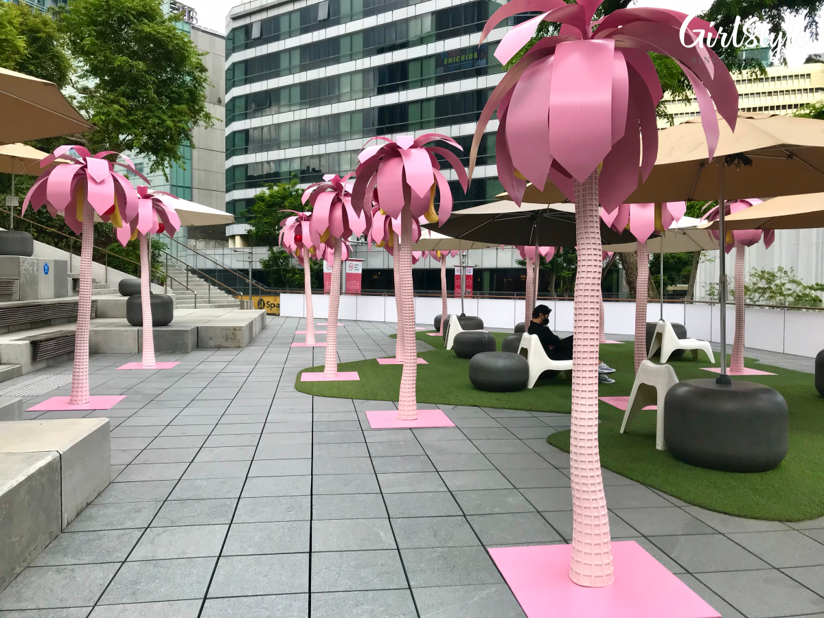 pink palm trees at design orchard pink retail showcase museum of ice cream singapore