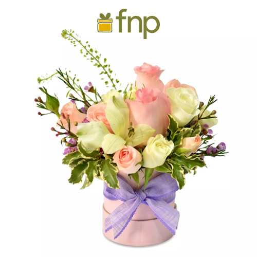 Mesmirising Floral Charm Arrangement, $55, FNP.
