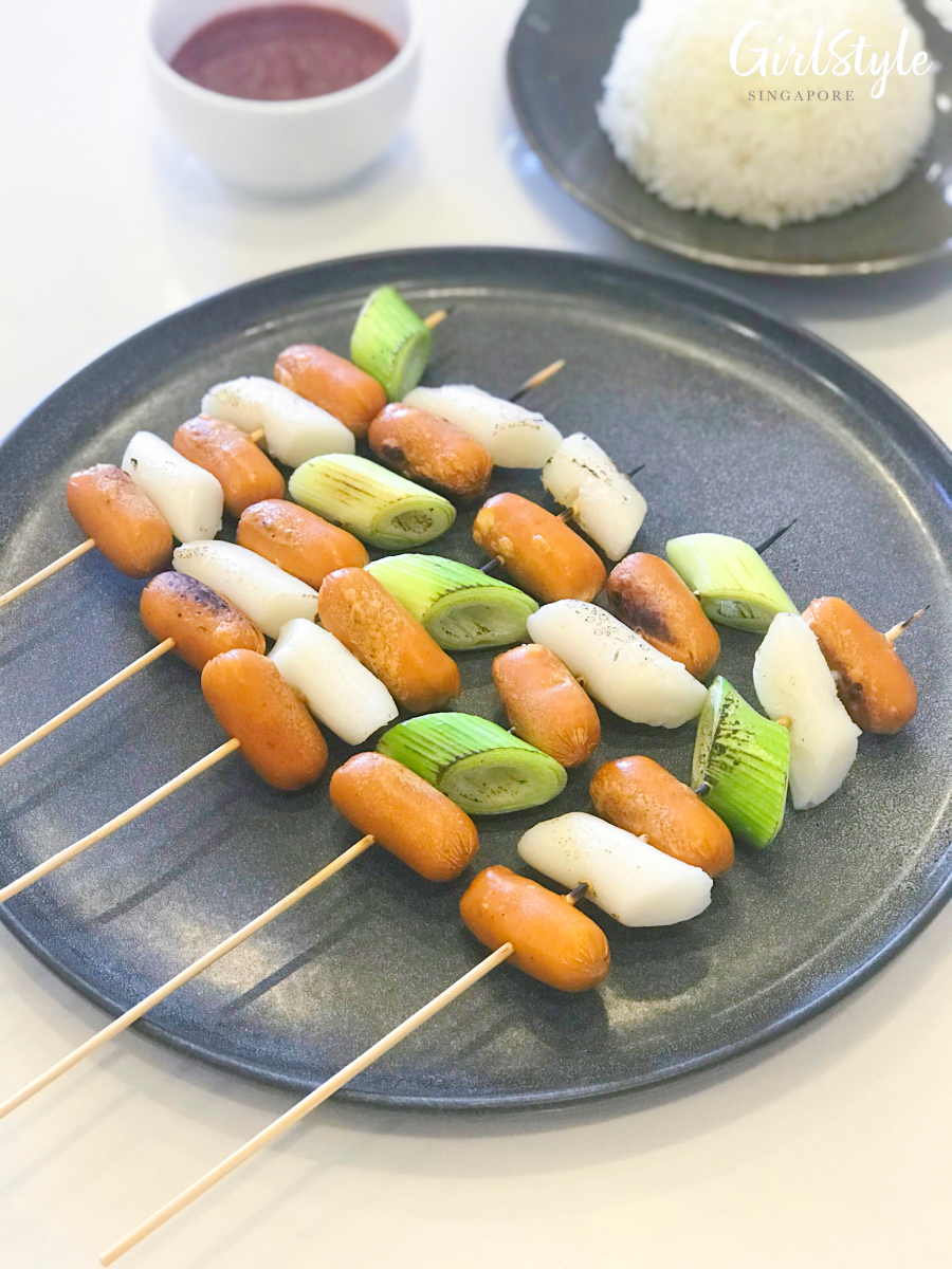 korean skewers with rice cake gourmet cheese sausages and onion