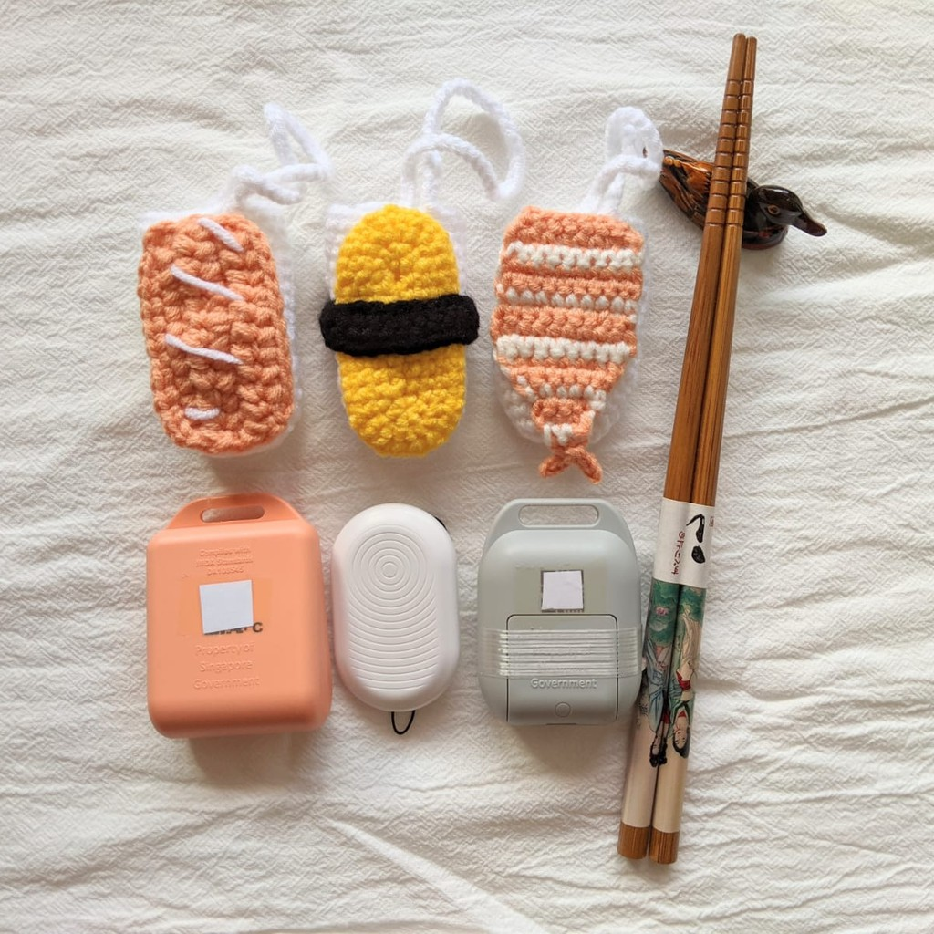 Knitted sushi TraceTogether Token sleeve