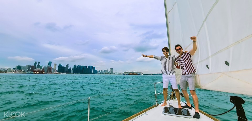 standing on private yacht EU Holidays singapore