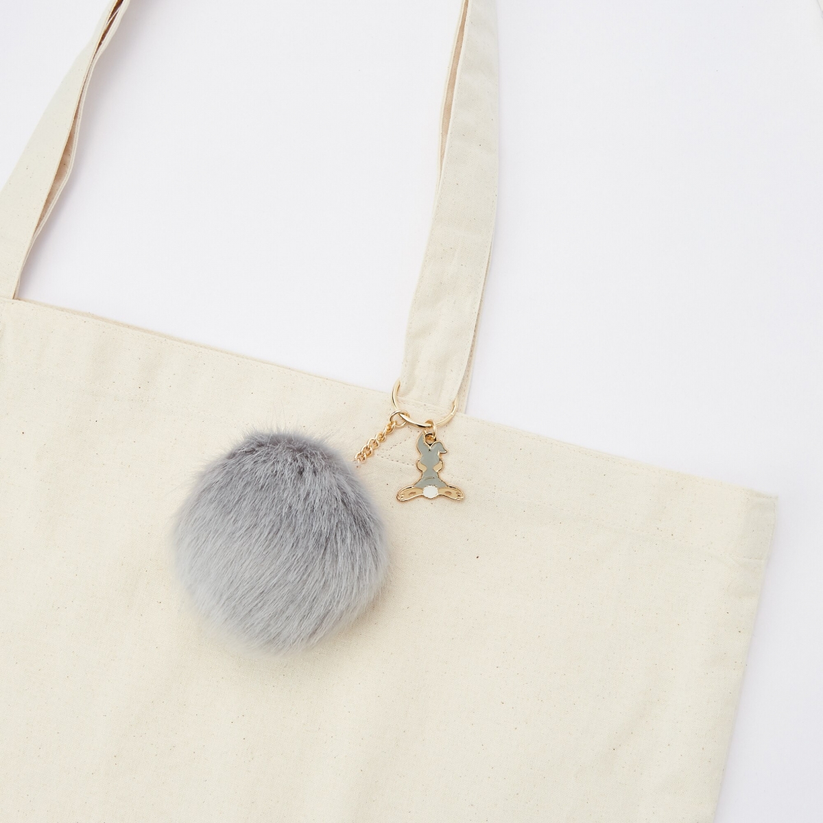 uniqlo singapore disney bambi thumper key chain pompom on bag