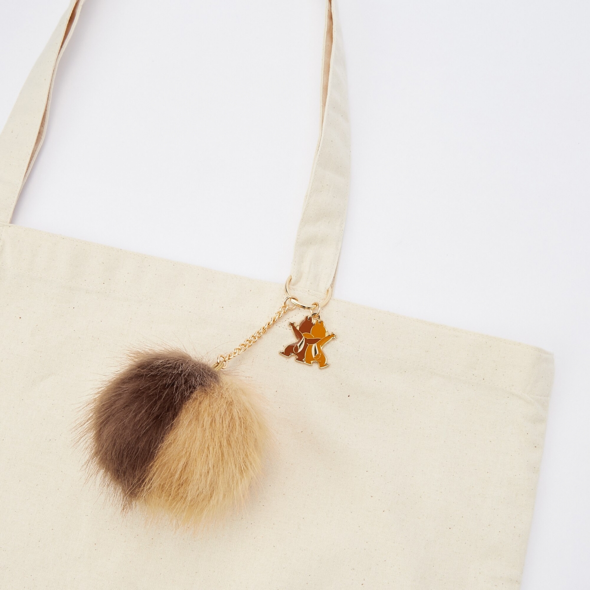 uniqlo singapore disney chip n dale keychain on bag