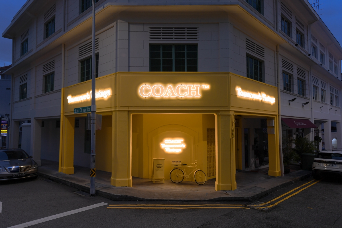 Coach Tomorrow's Vintage facade in the night