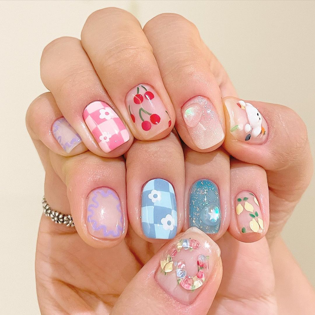 colourful korean style nail art with poodle design
