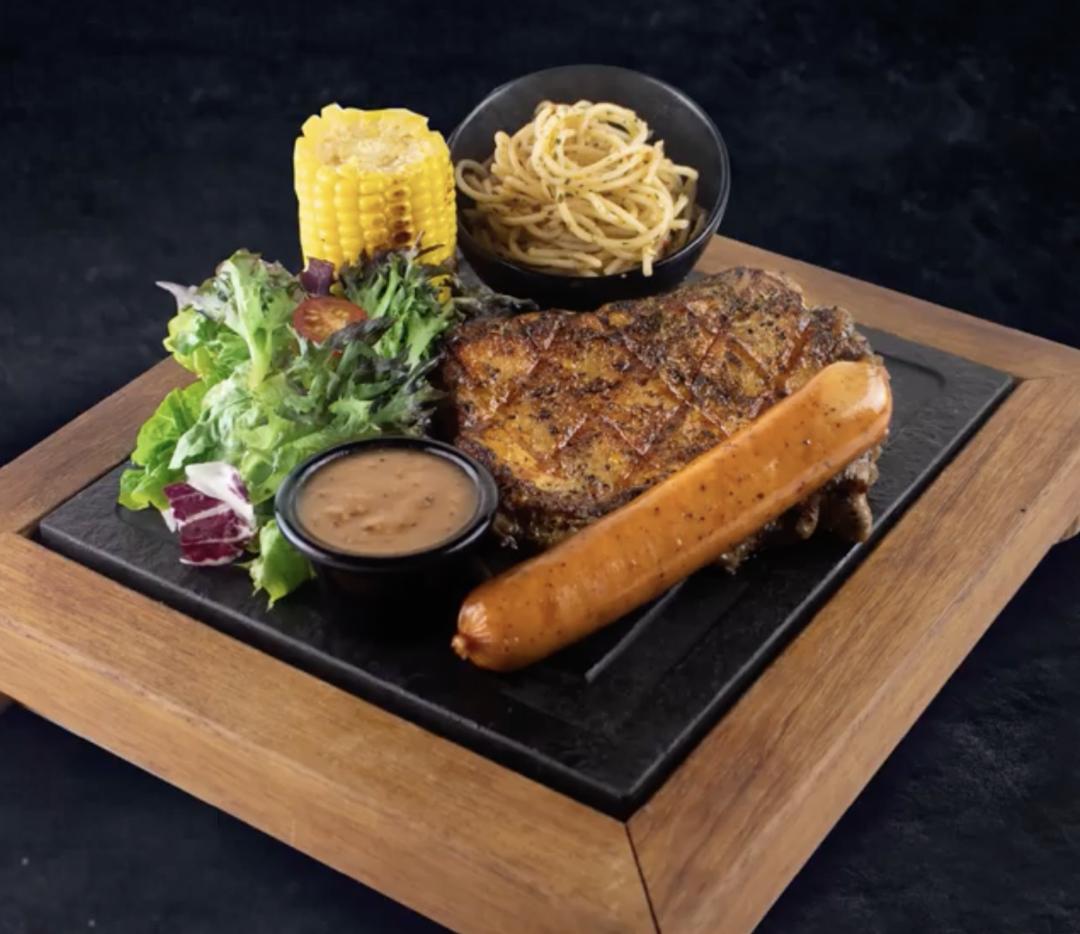 collins singapore Signature Grilled Chicken Chop with Summer Kabana Pork Sausage