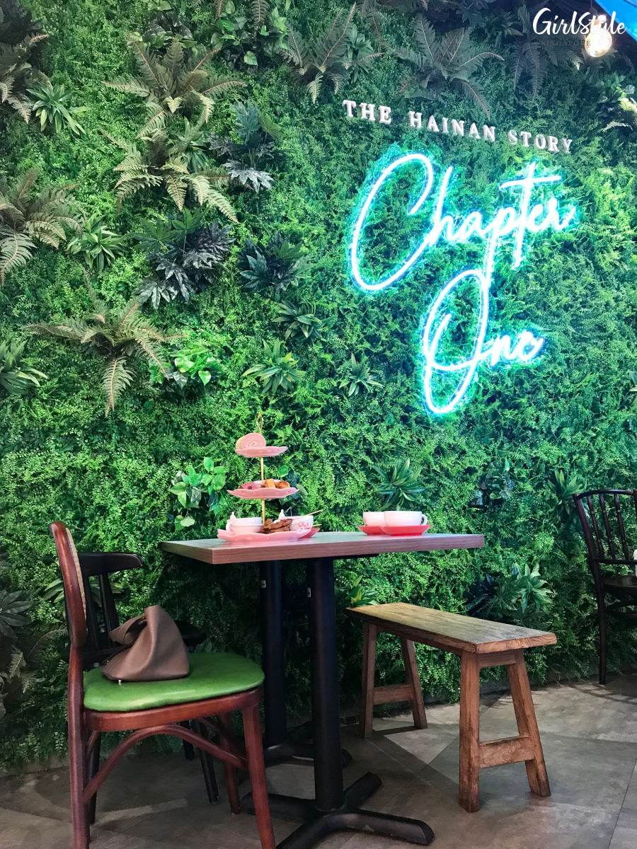 interior and green wall with neon lights at The Hainan Story hotel boss restaurant