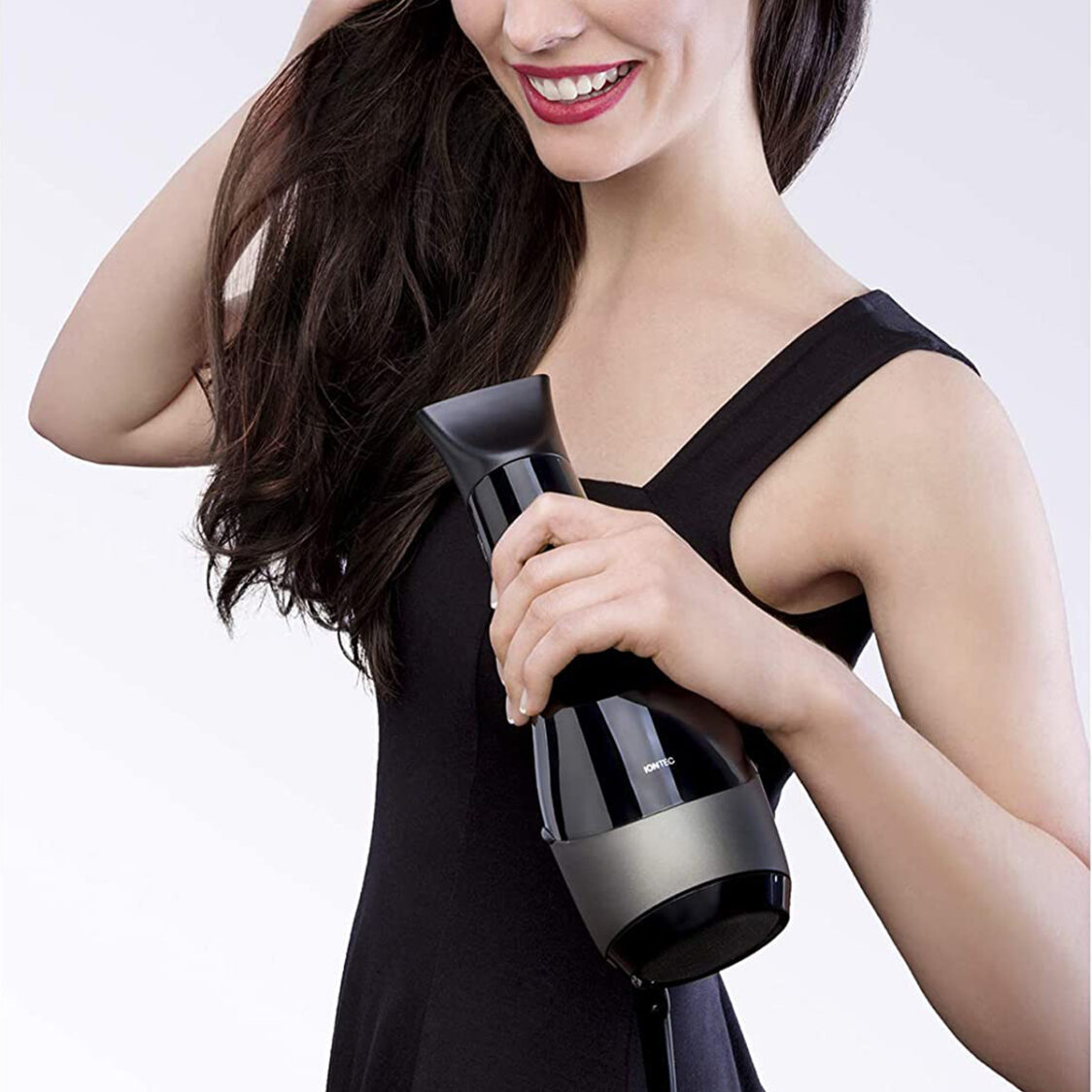 woman holding Braun Satin Hair 7 HD785 Professional Senso Dryer singapore