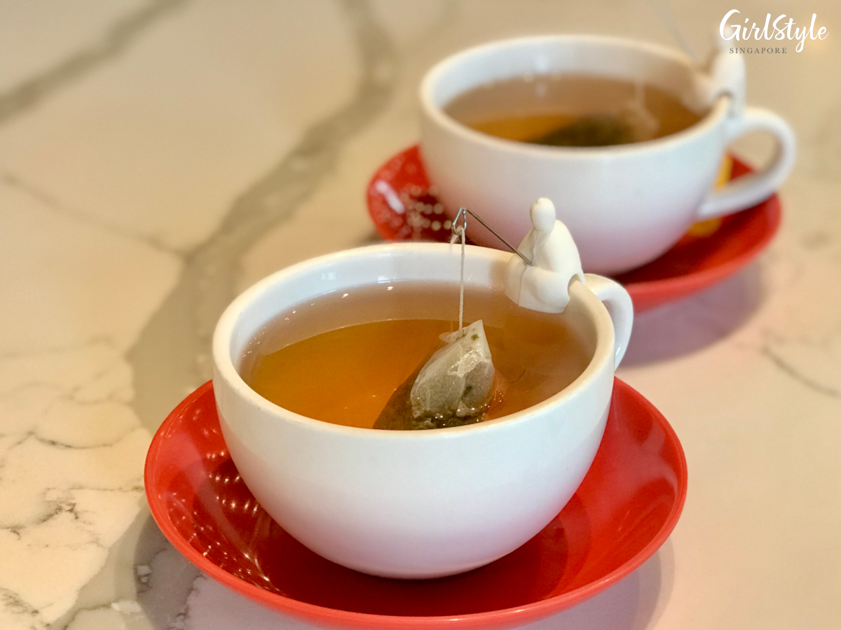 chinese tea in cups with diao yu fishing design at The Hainan Story