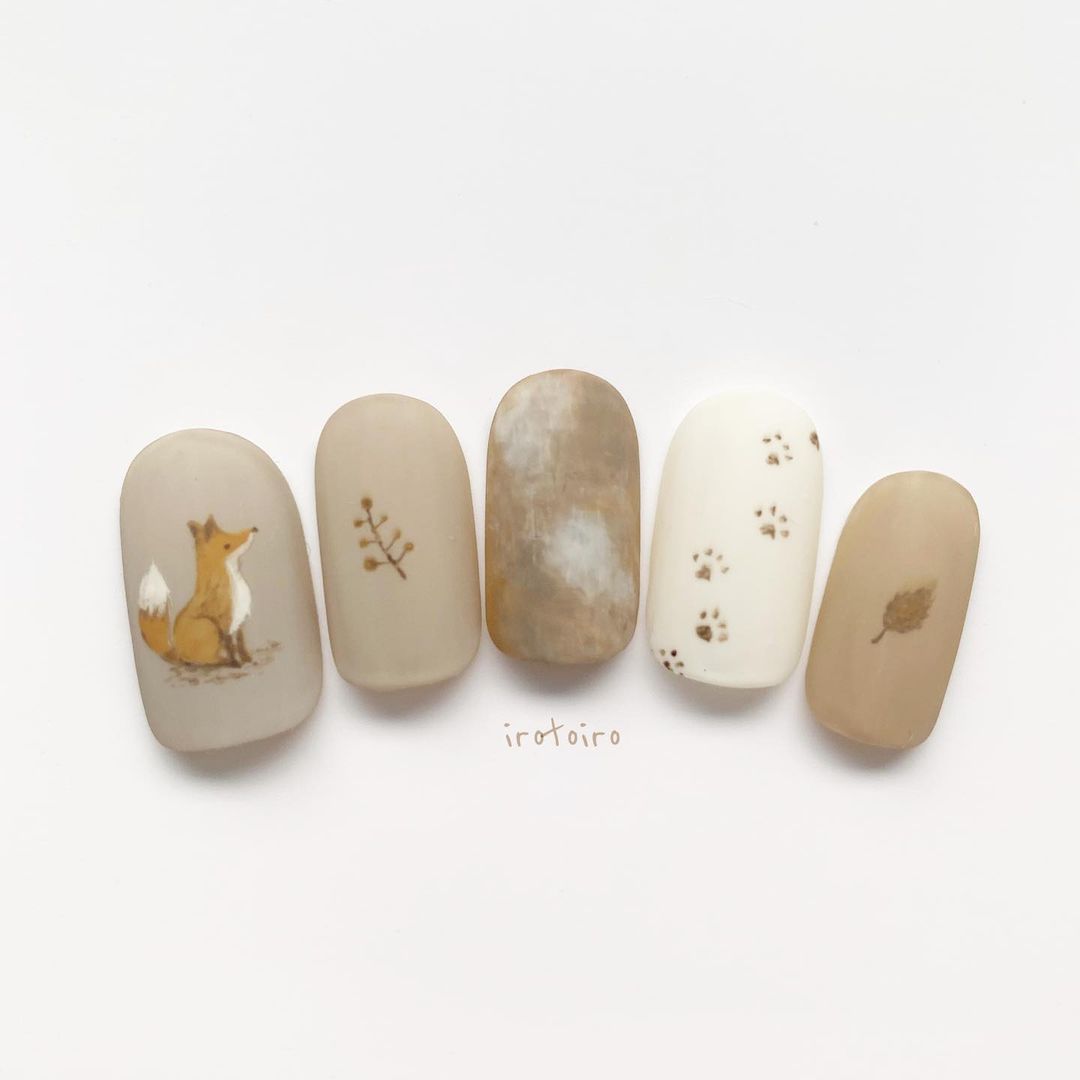 japanese autumn-themed fox nails