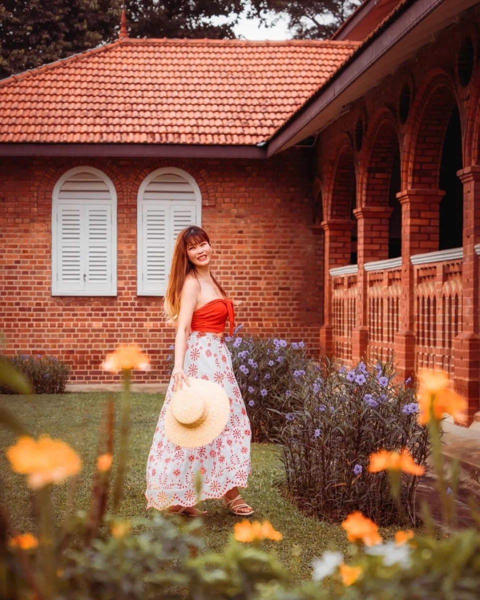 chervon khoo at saint george church singapore with flower bed