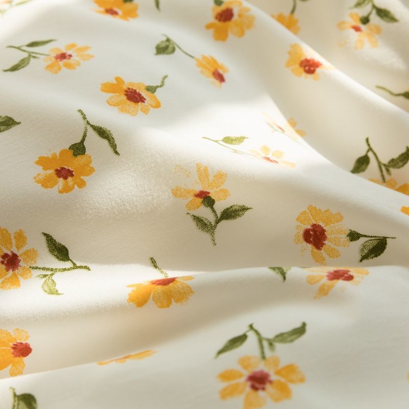 close up print of yellow flowers quilt and green korean style bed sheet set singapore