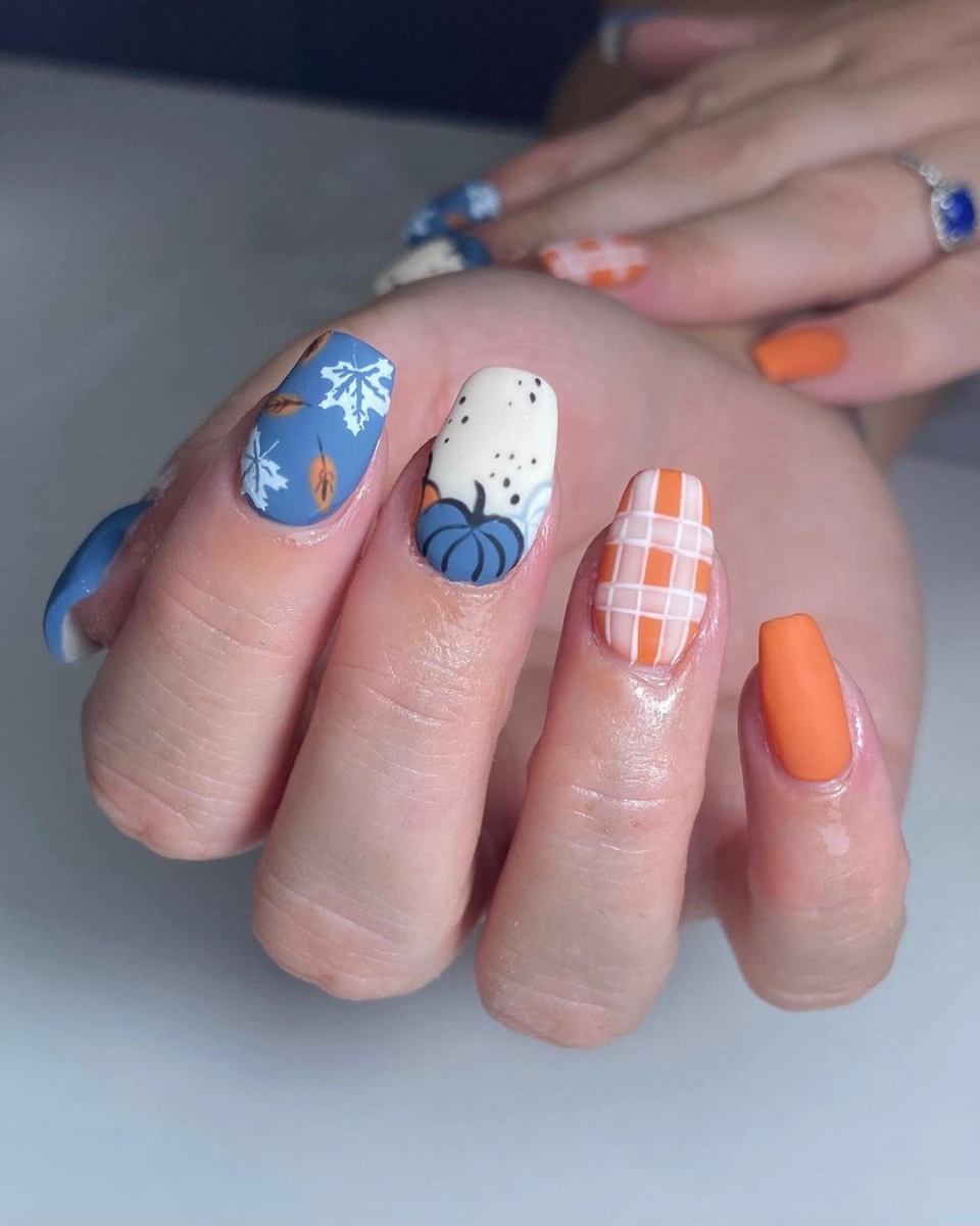Pumpkin nails with checkered designs