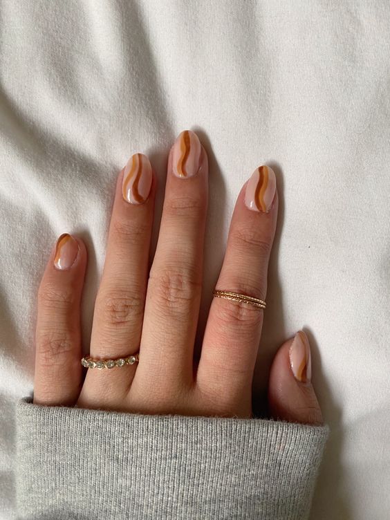 brown swirl nail design