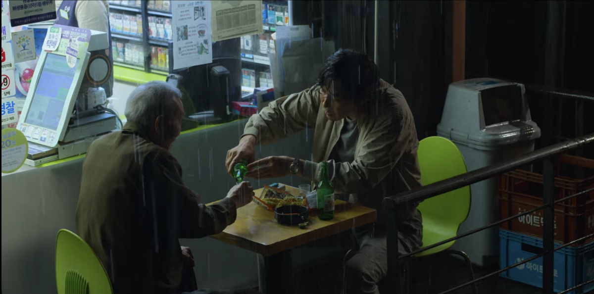 squid game scene oh il nam old man and gi hun eating raw ramen and soju episode 2