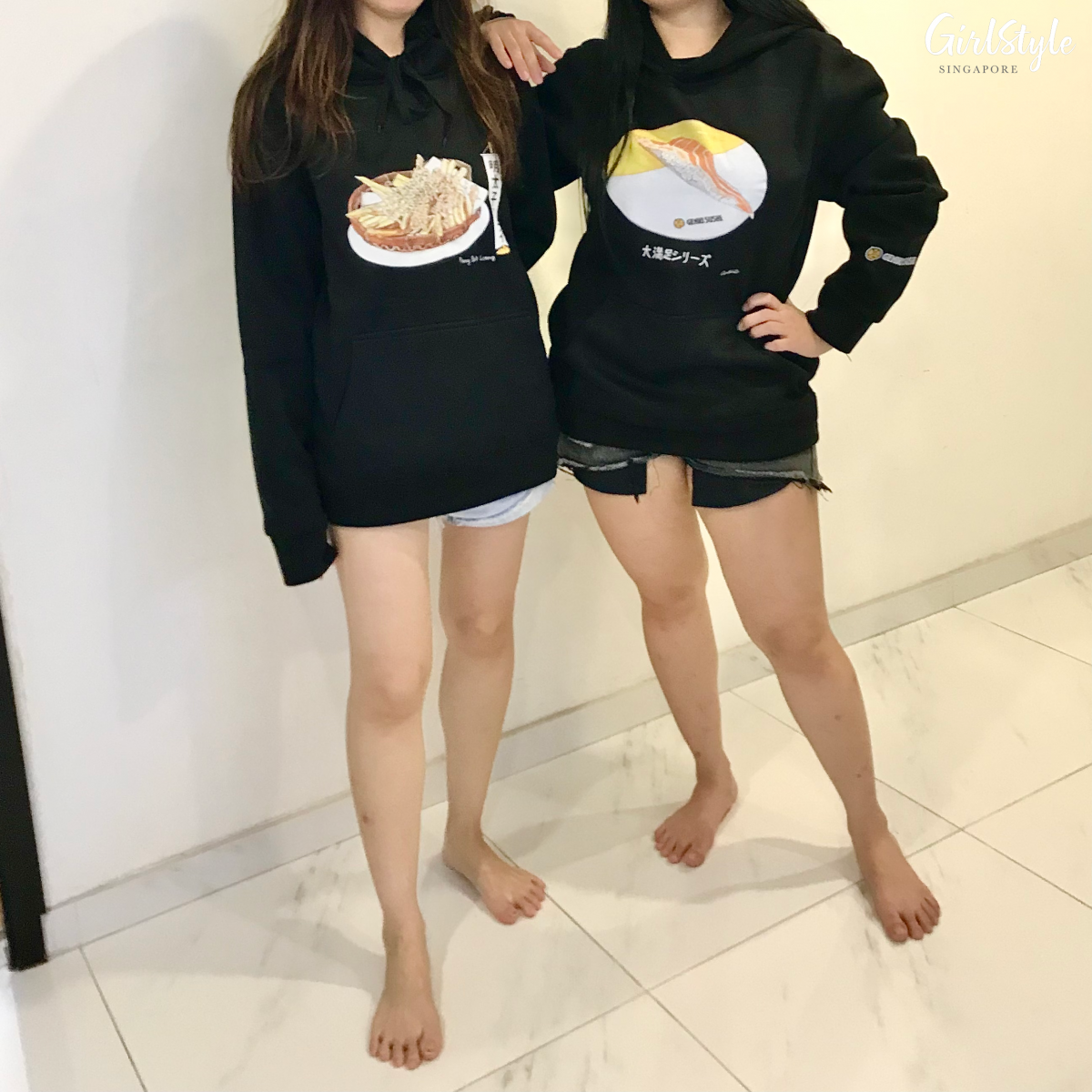 women wearing black genki sushi mentail fries and salmon belly pullovers