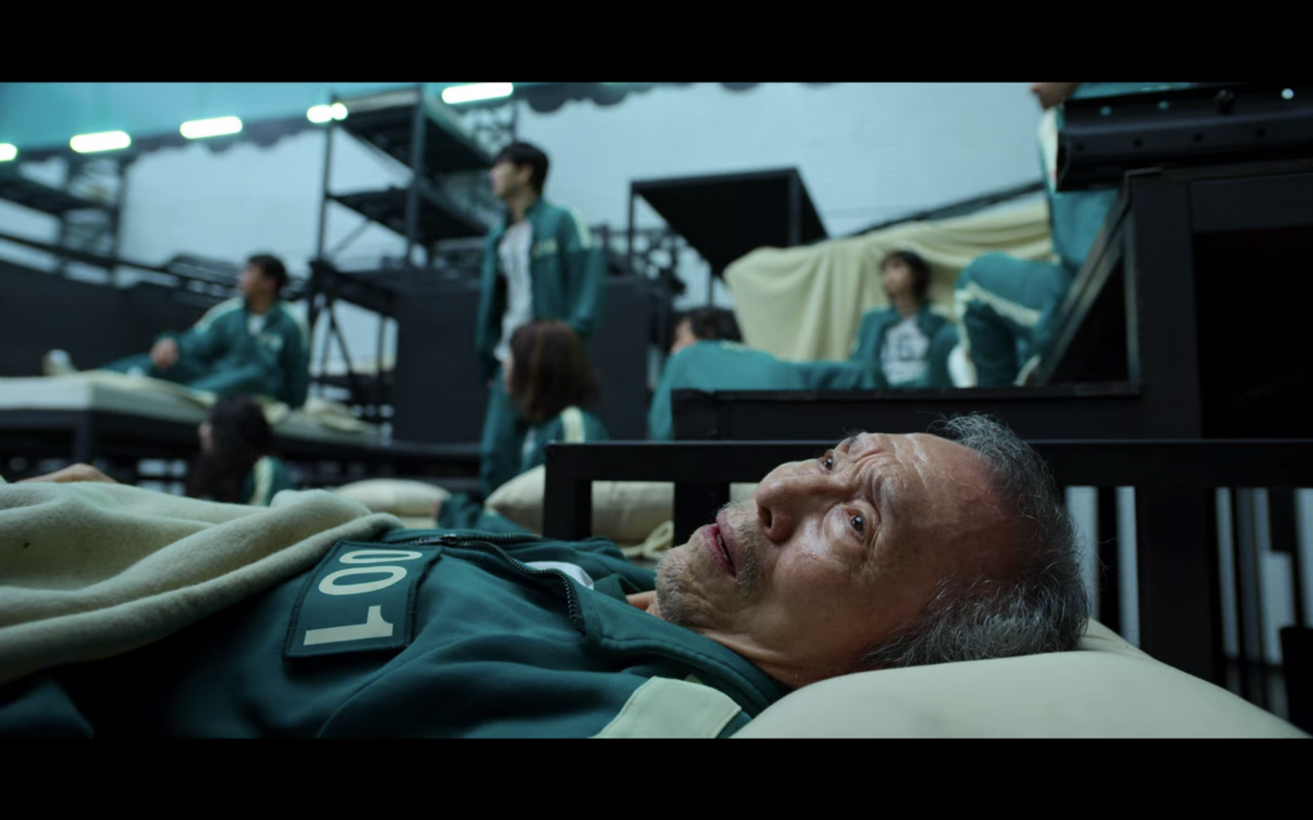 squid game old man looking scared when alarm goes off