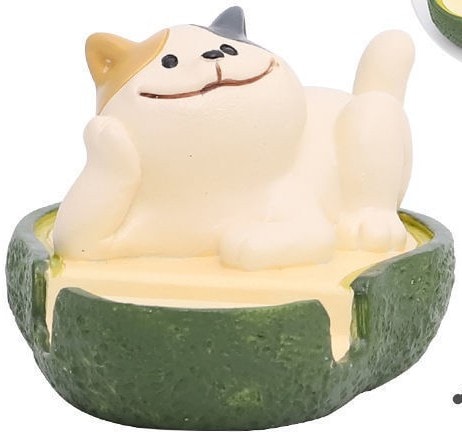 Cat on an avocado phone stand