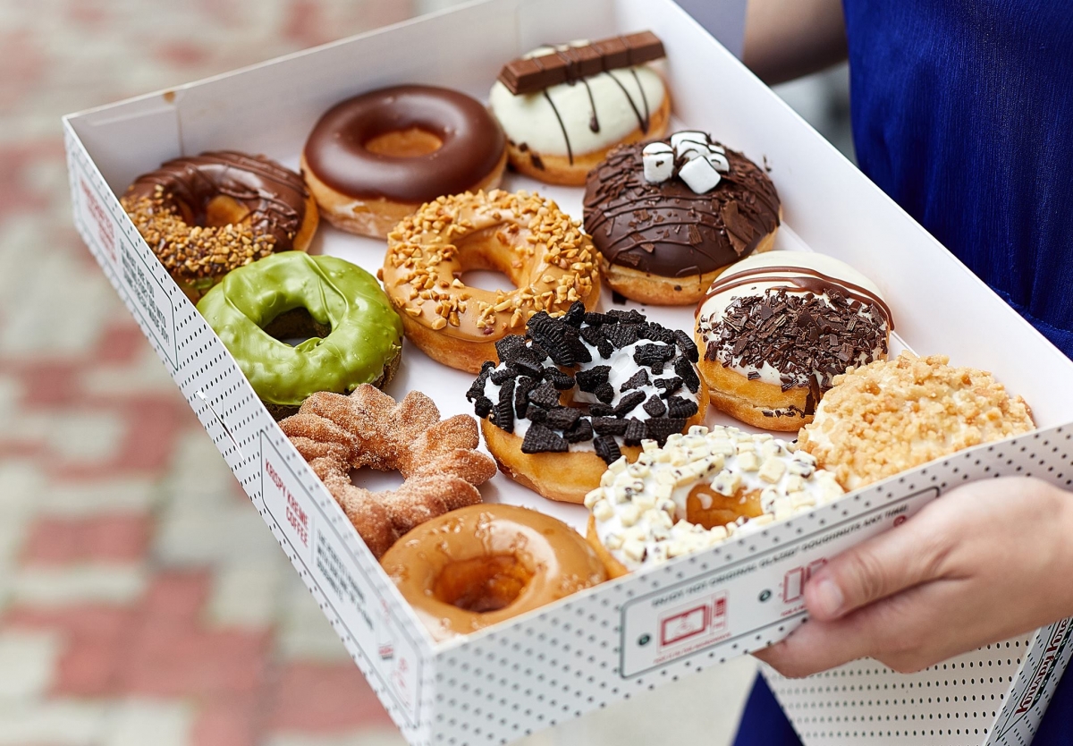 box of a dozen assorted Krispy Kreme doughnuts
