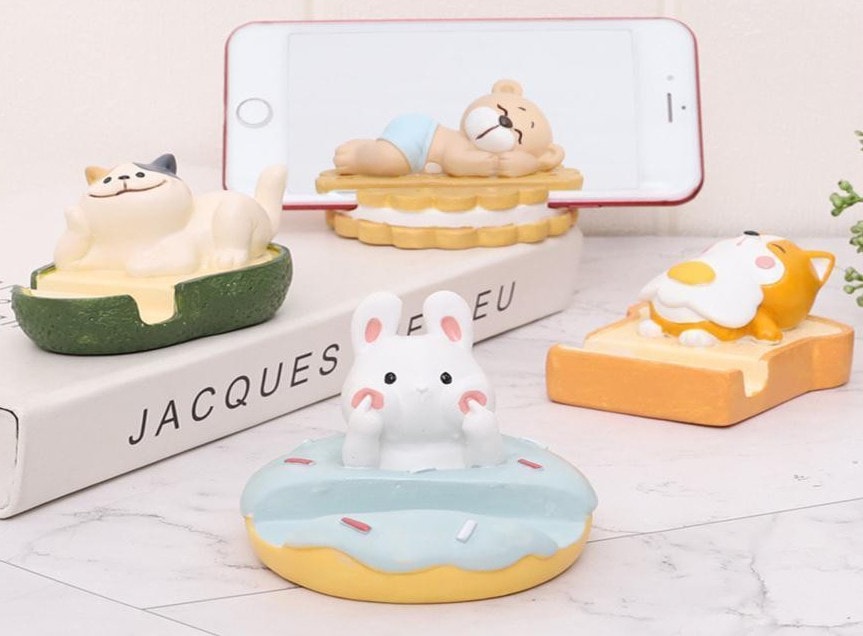 Animal-themed phone stands featuring a cat, dog, bear and bunny
