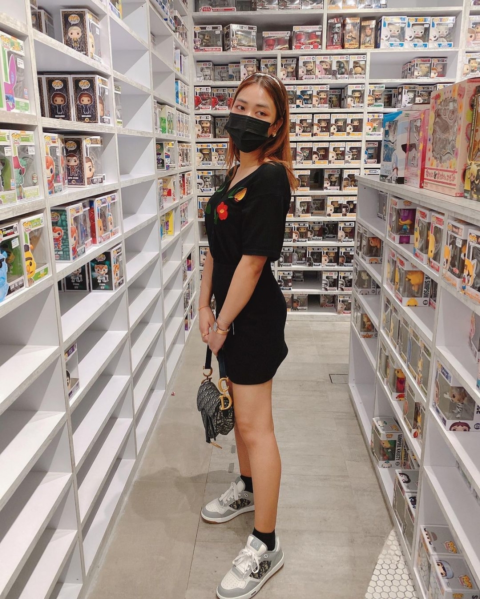 woman standing at simply toys store vivocity