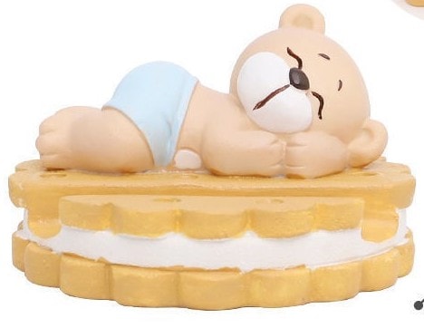 Bear on a biscuit phone stand
