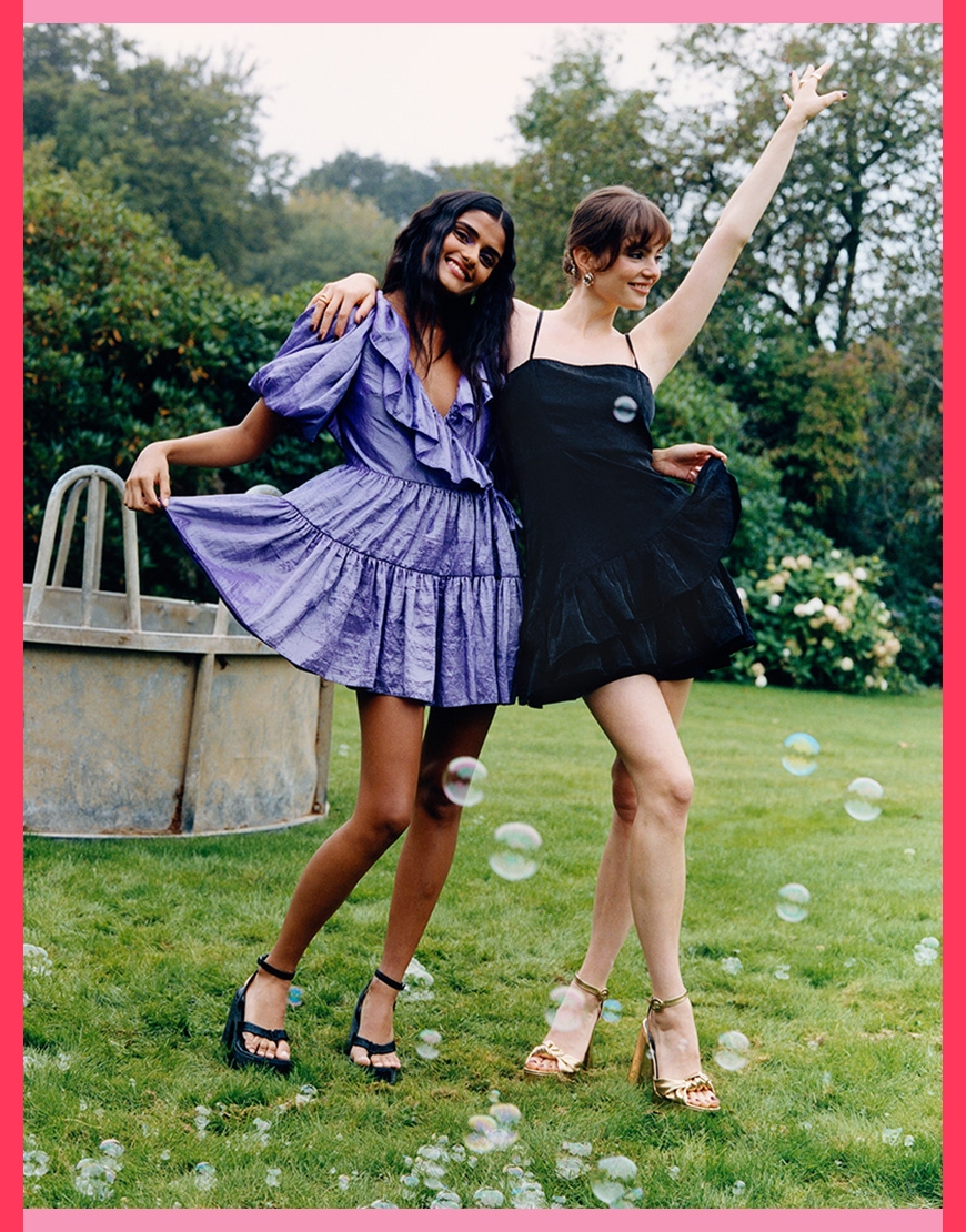 two women wearing asos dresses and heels