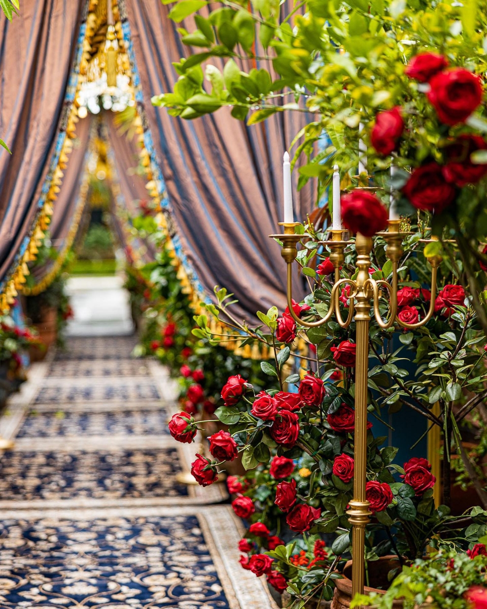 Rose-filled corridor at Beauty and the Beast-themed cafe The Grounds of Alexandria