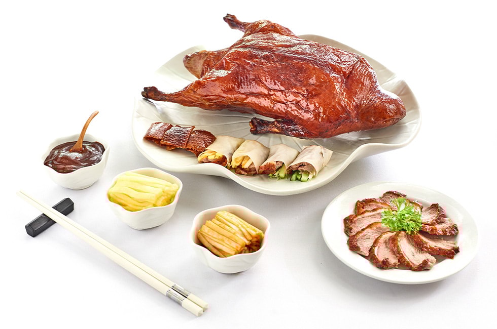 Wood-fired Beijing Duck served with Homemade Crepes at Min Jiang Dempsey