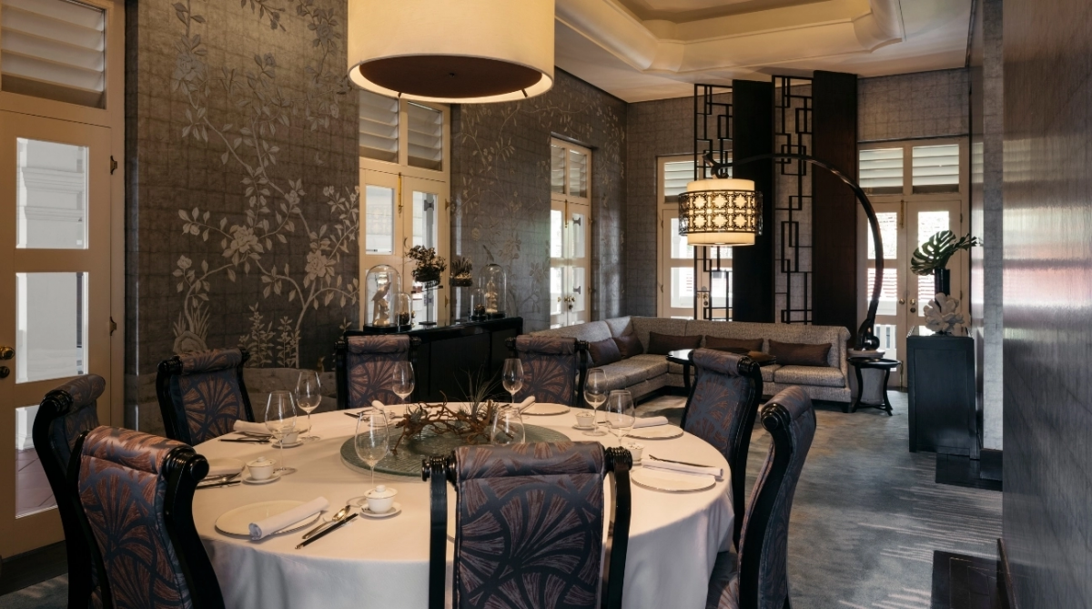 Interior seating at Cassia restaurant in Capella Singapore