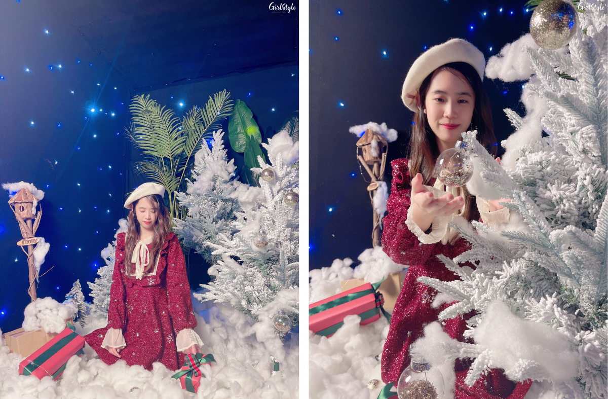 Night time starry sky backdrop with fake snow and Christmas tree at I WAN Selfie Studio