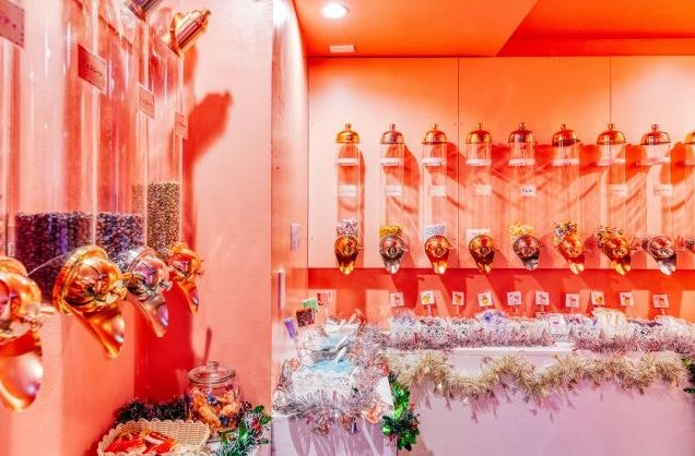 Wall mounted candy dispensers at Sweets Hotel Ruby in Shibuya, Japan