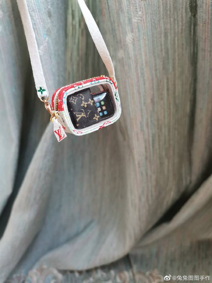 Miniature Louis Vuitton camera bag and wallet