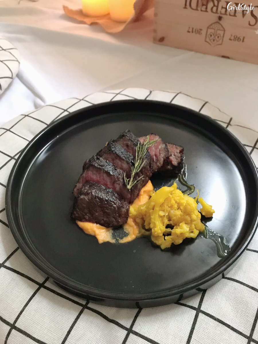 Beef short rib steak with cauliflower at The Secret Patio Indoor Planetarium Campfire Night pop up dining