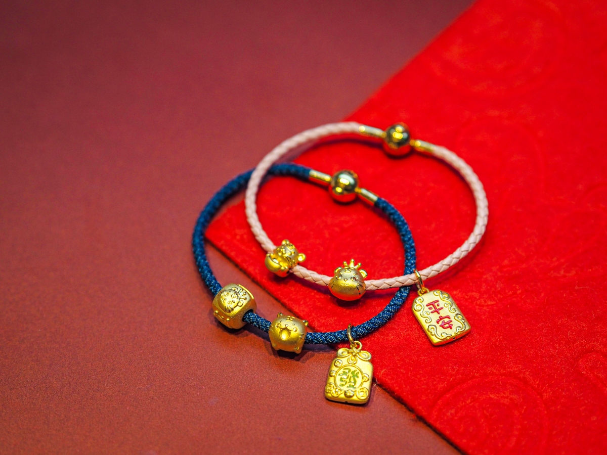 (On pink bracelet) CHOW TAI FOOK 999 Pure Gold Charm - Year of the Tiger Collection [Ingot], $170, CHOW TAI FOOK 999 Pure Gold Charm - Zodiac Tiger Collection [Crown], $180. CHOW TAI FOOK 999 Pure Gold Charm [Peace], $310. (On blue bracelet) CHOW TAI FOOK 999 Pure Gold Charm - Year of the Tiger Collection [Crown], $270. CHOW TAI FOOK 999 Pure Gold Charm - Year of the Tiger Collection $180. CHOW TAI FOOK 999 Pure Gold Charm [Fortune], $310. 