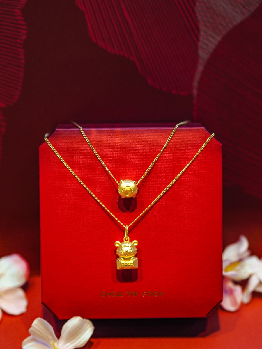 CHOW TAI FOOK 999 Pure Gold Charm - Year of the Tiger Collection $180. CHOW TAI FOOK 999 Pure Gold Pendant - Tiger Zodiac [Wealth], $330. 